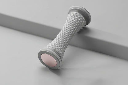 Rouleau massant gris